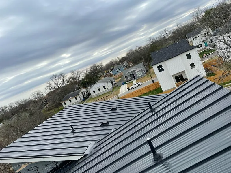 Standing seam metal roof panels with vents for Skylight Repair in Notre Dame